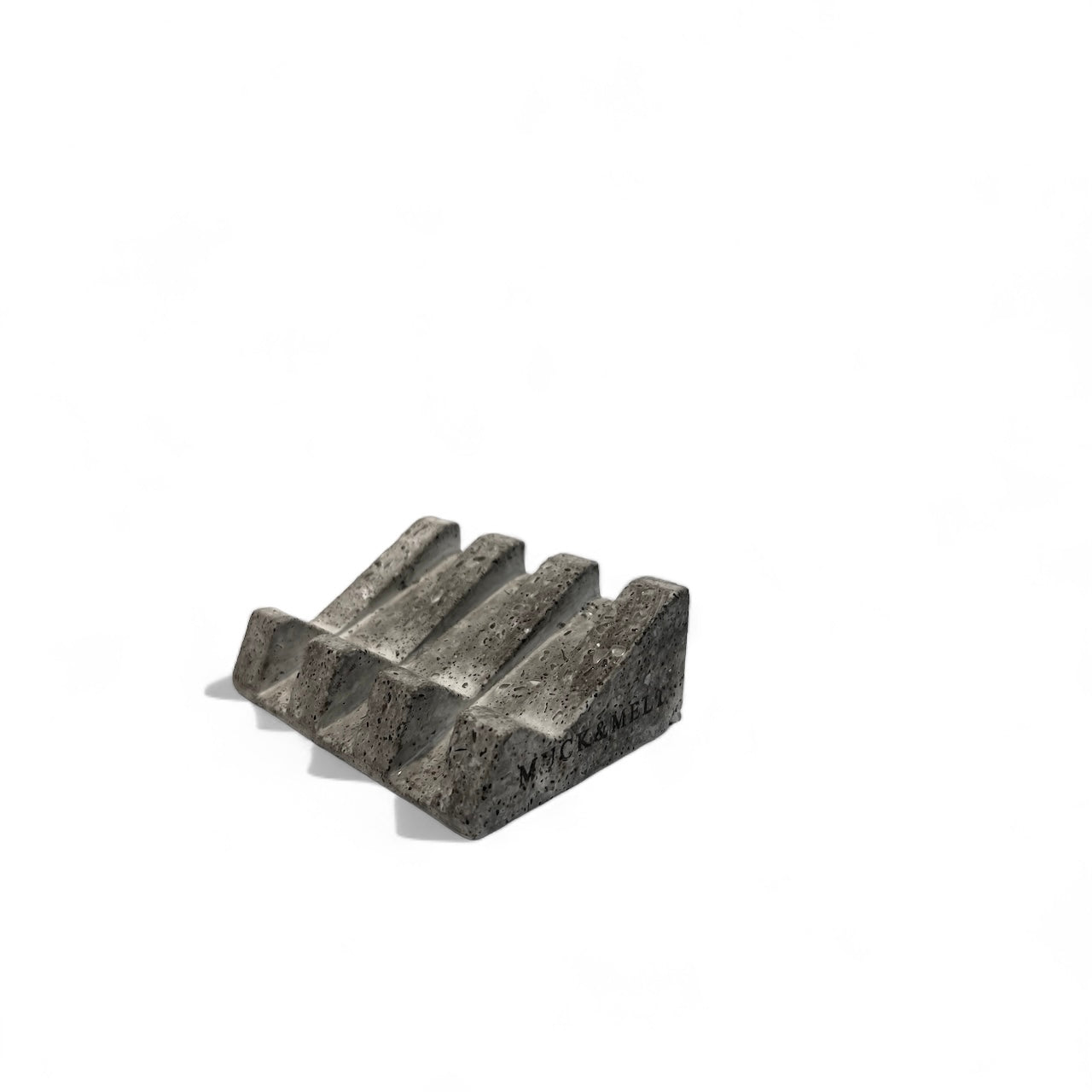 Handcrafted grey soap dish inspired by rugged rocks and raw textures