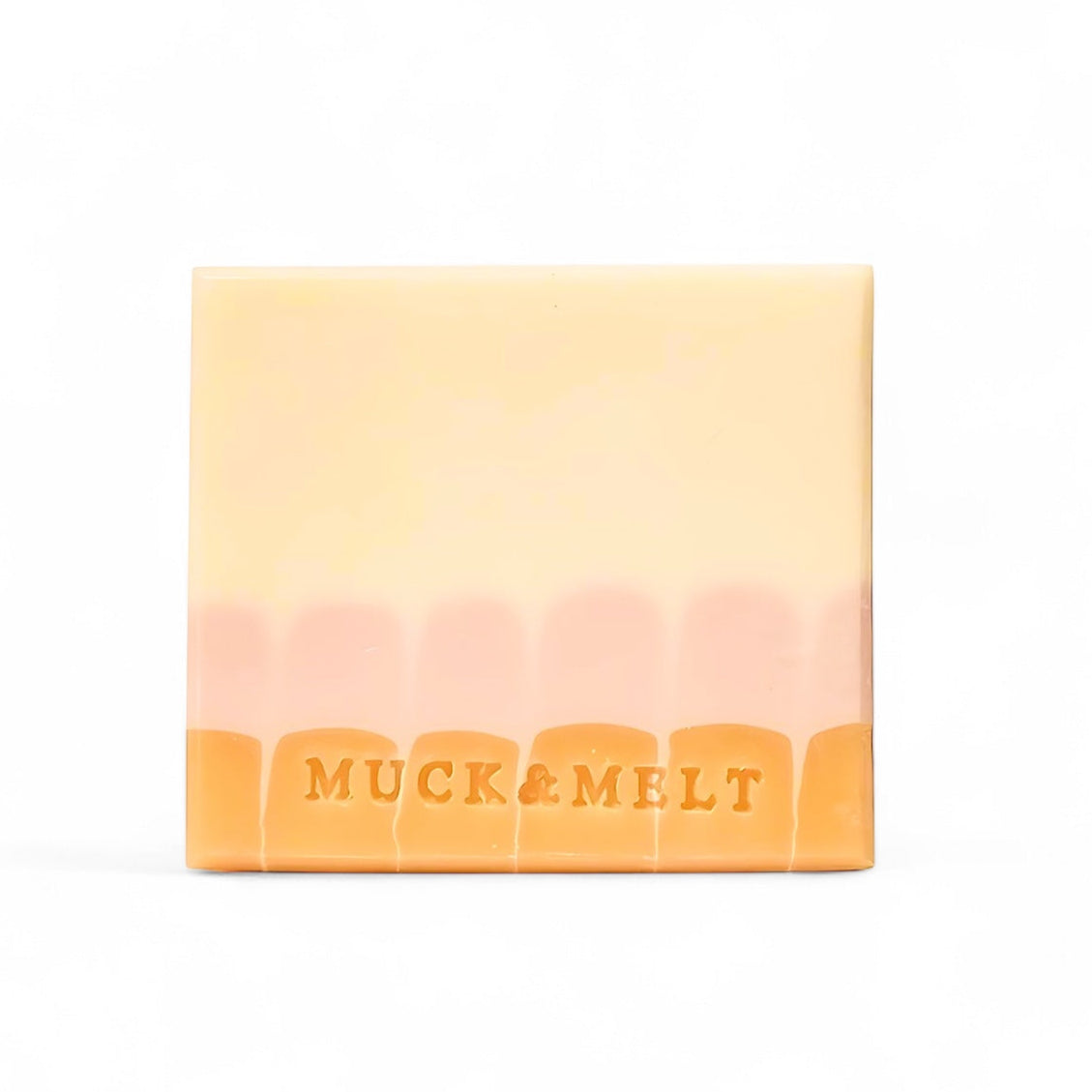 Handmade natural soap with delicate scallop-inspired design and soft, summer tones