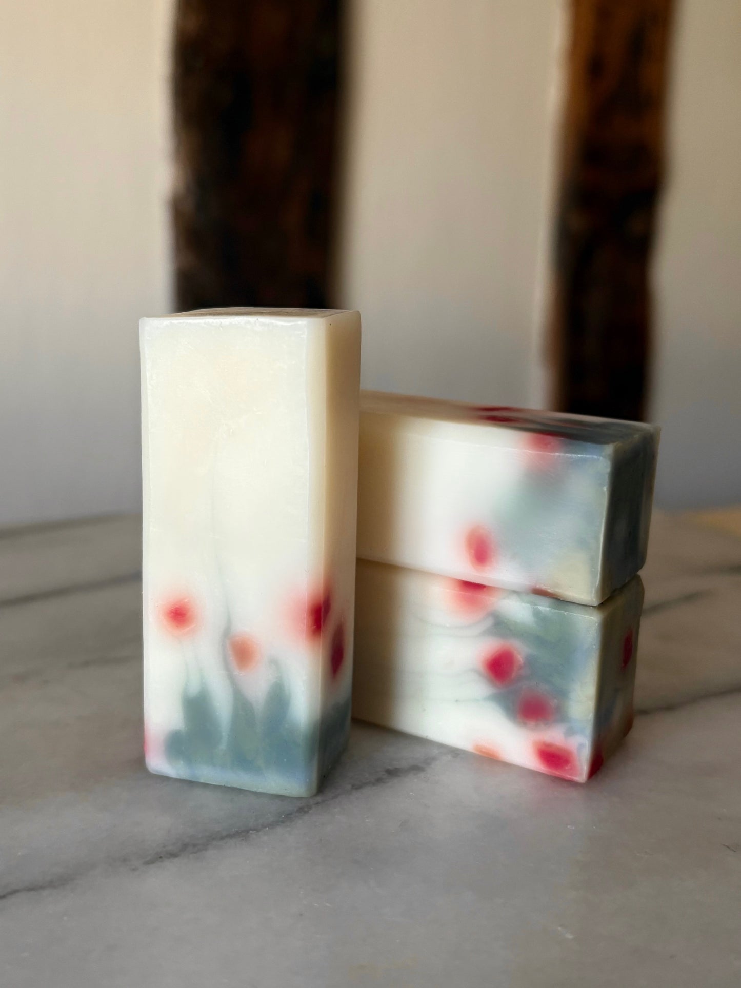 close up Mini Poppies mini handmade natural soap — flower-inspired luxury soap bar for travel or gifting.