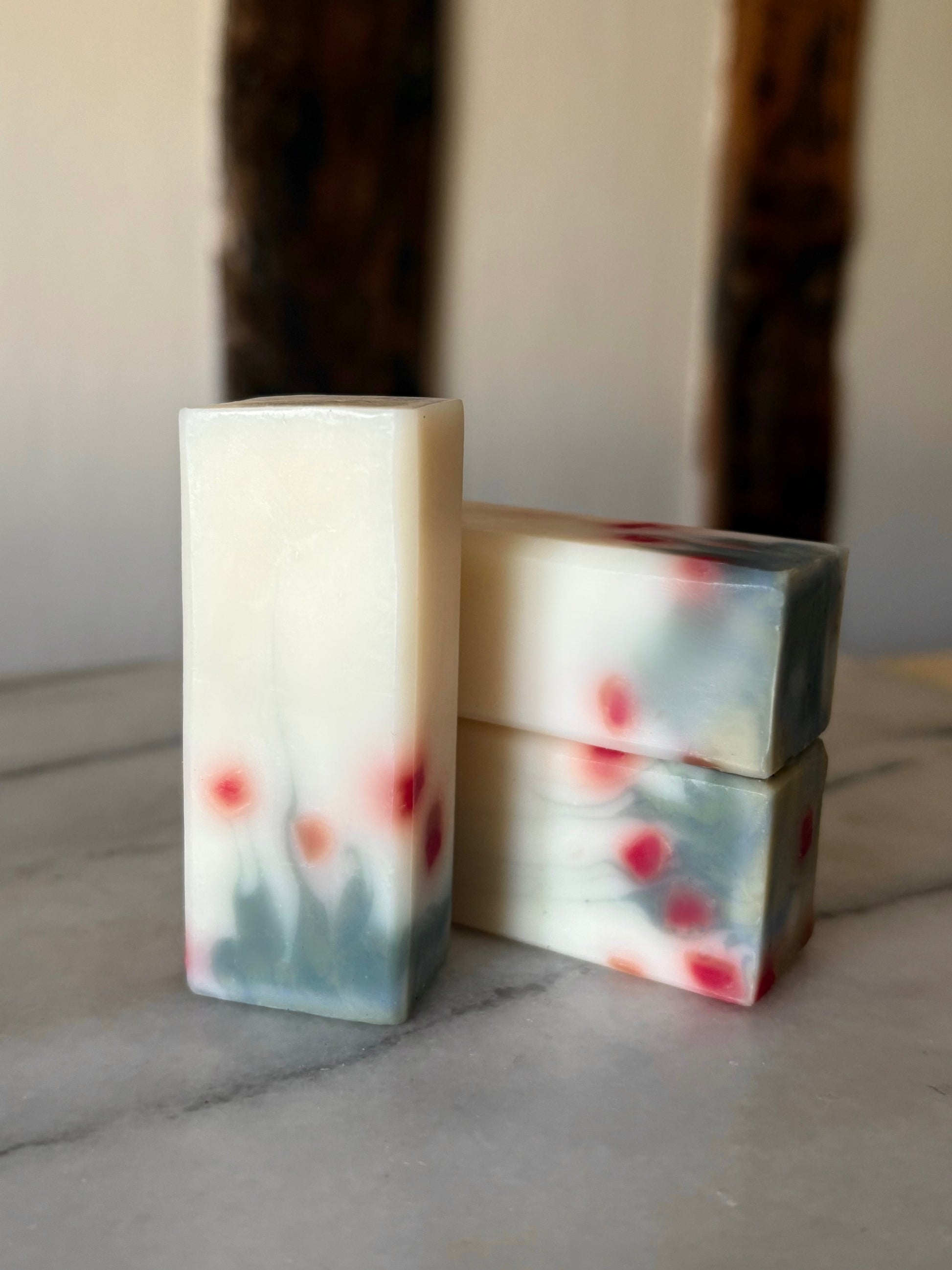 close up Mini Poppies mini handmade natural soap — flower-inspired luxury soap bar for travel or gifting.