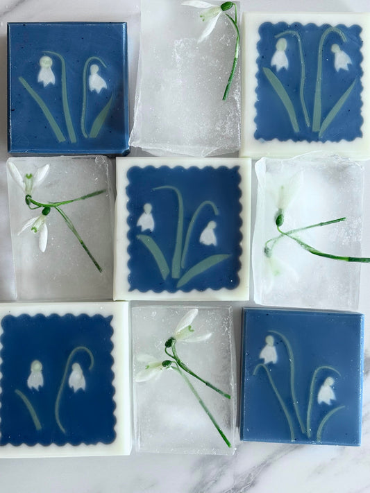 handmade artisan soap featuring snowdrop flower motifs and snowdrops preserved in ice