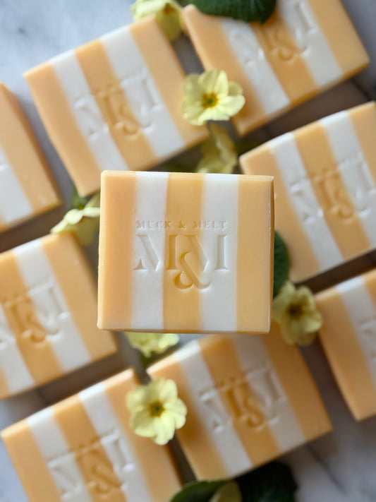 Yellow and white striped natural soaps with a lemon scent. 