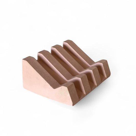 Terracotta-toned soap dish with organic drainage design for lasting soap care
