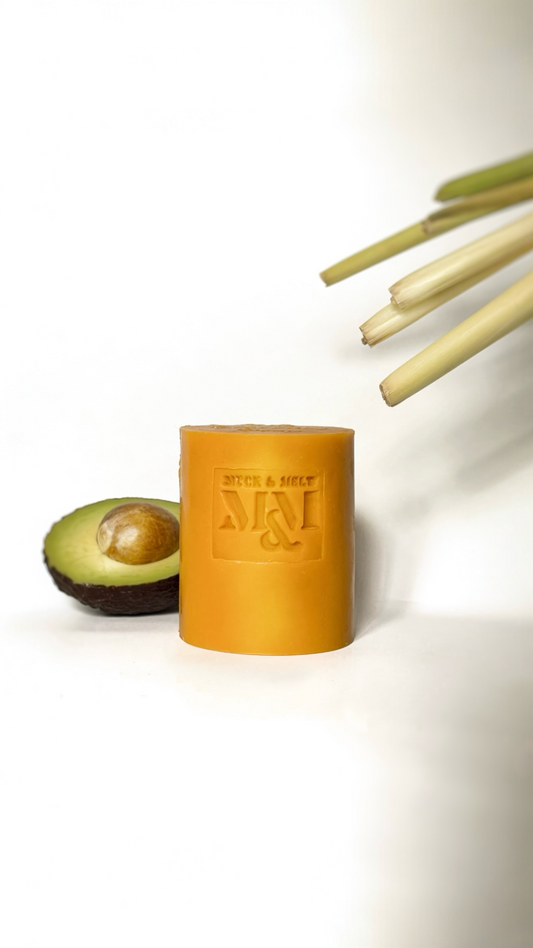 Bright yellow handmade avocado soap bar scented with lemongrass, orange and neroli essential oils.
